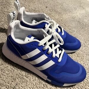 Brand new (men’s 8-1/2) Royal Blue ADIDAS.